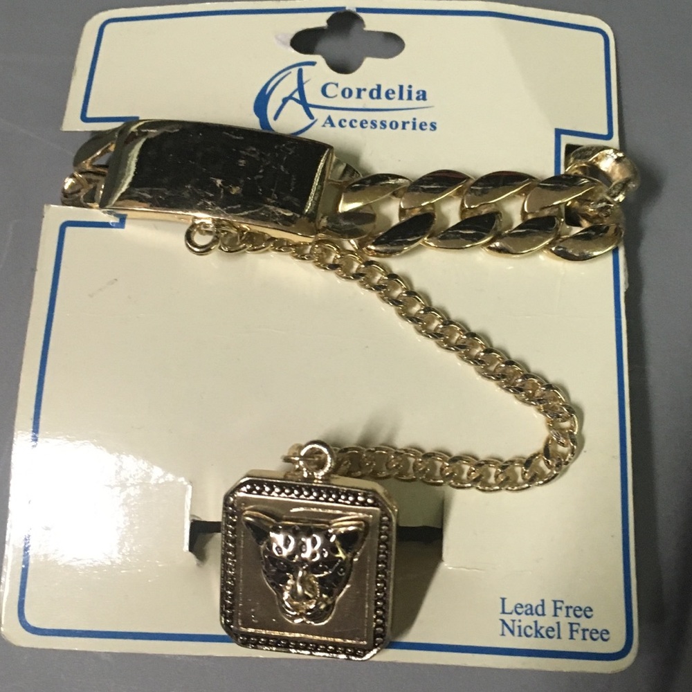 Cuban link bracelet with matching Lionhead ring